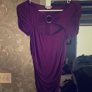 Purple top with gold chest jewel